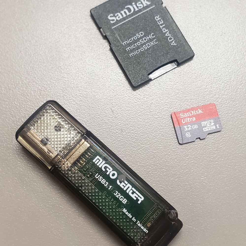 MicroCenter USB Drive 32gb and Sandisk MICRO SD Card 32gb with Card Adapter